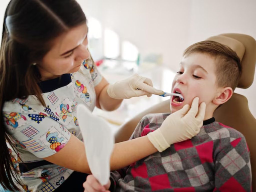 parent helping a child manage tooth pain with gentle home care before a dental visit